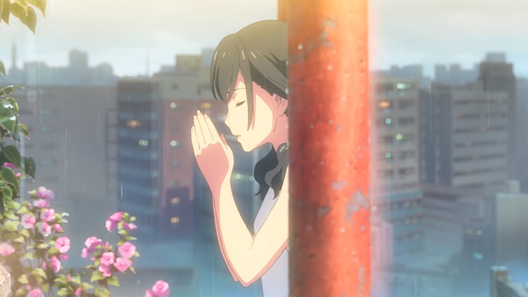 Hina Amano praying with her eyes closed