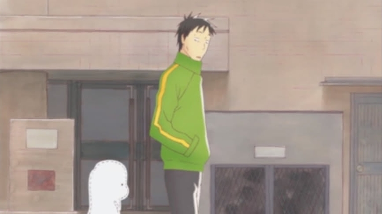 Daikichi Kawachi and Rin Kaga standing outdoors in a casual scene from the Usagi Drop anime.