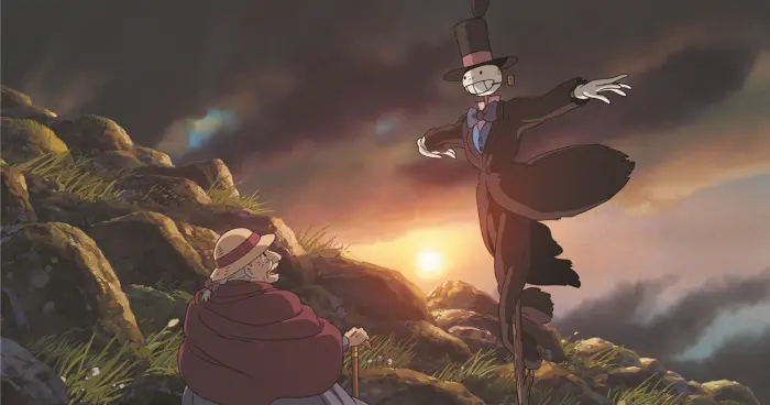 Old Sophie sits with the enchanted scarecrow, Turnip Head, during a vibrant sunset in the anime movie Howl's Moving Castle.