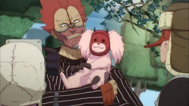 En holds his demonic pet while wearing his signature mask