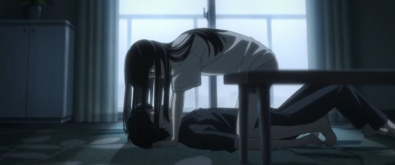 Kaoru and Anzu in a dimly lit room showing the films atmosphere