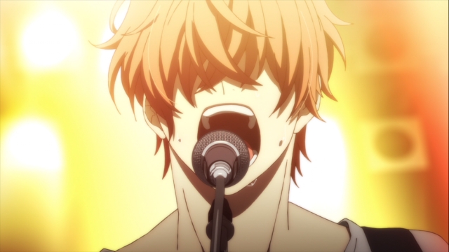 Mafuyu Sato singing with intense emotion into a microphone during a live band performance in the Given anime series.