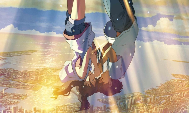 Hodaka and Hina share an intimate moment while falling through the sky above a sun-drenched Tokyo in Weathering with You.