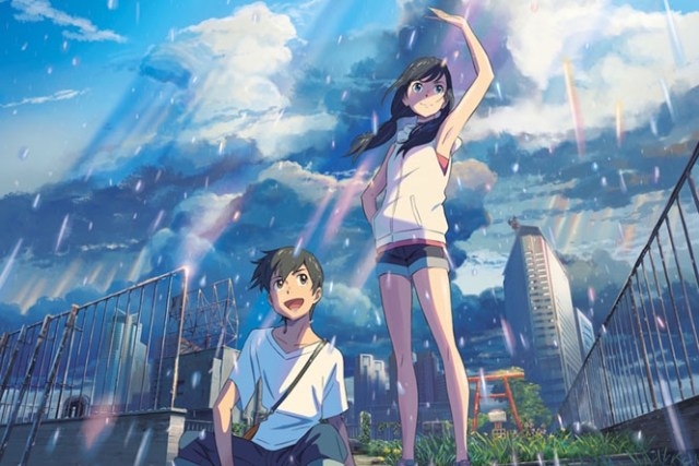 Hodaka Morishima and Hina Amano stand under a rain-filled sky in a scene from Makoto Shinkai's anime movie Weathering With You.