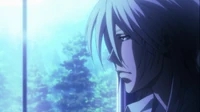 Makishima gazing out window