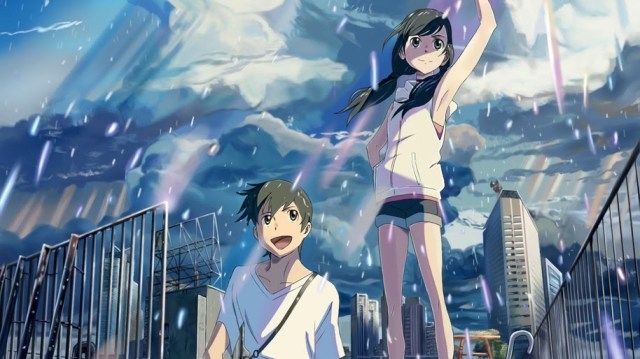 Hodaka Morishima and Hina Amano standing on a rooftop overlooking rain-swept Tokyo